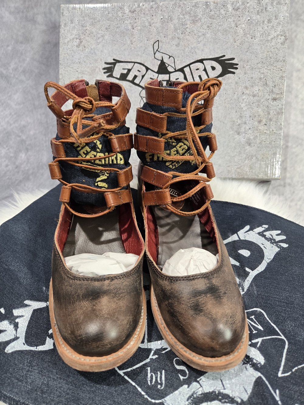 Freebird by Steven Malone booties in a distressed cognac multi-leather color
